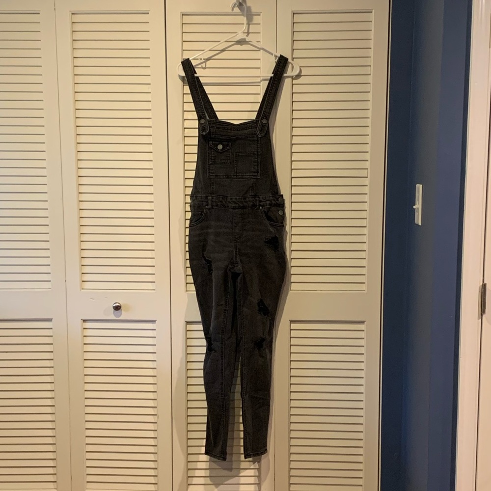 Distressed skinny overalls